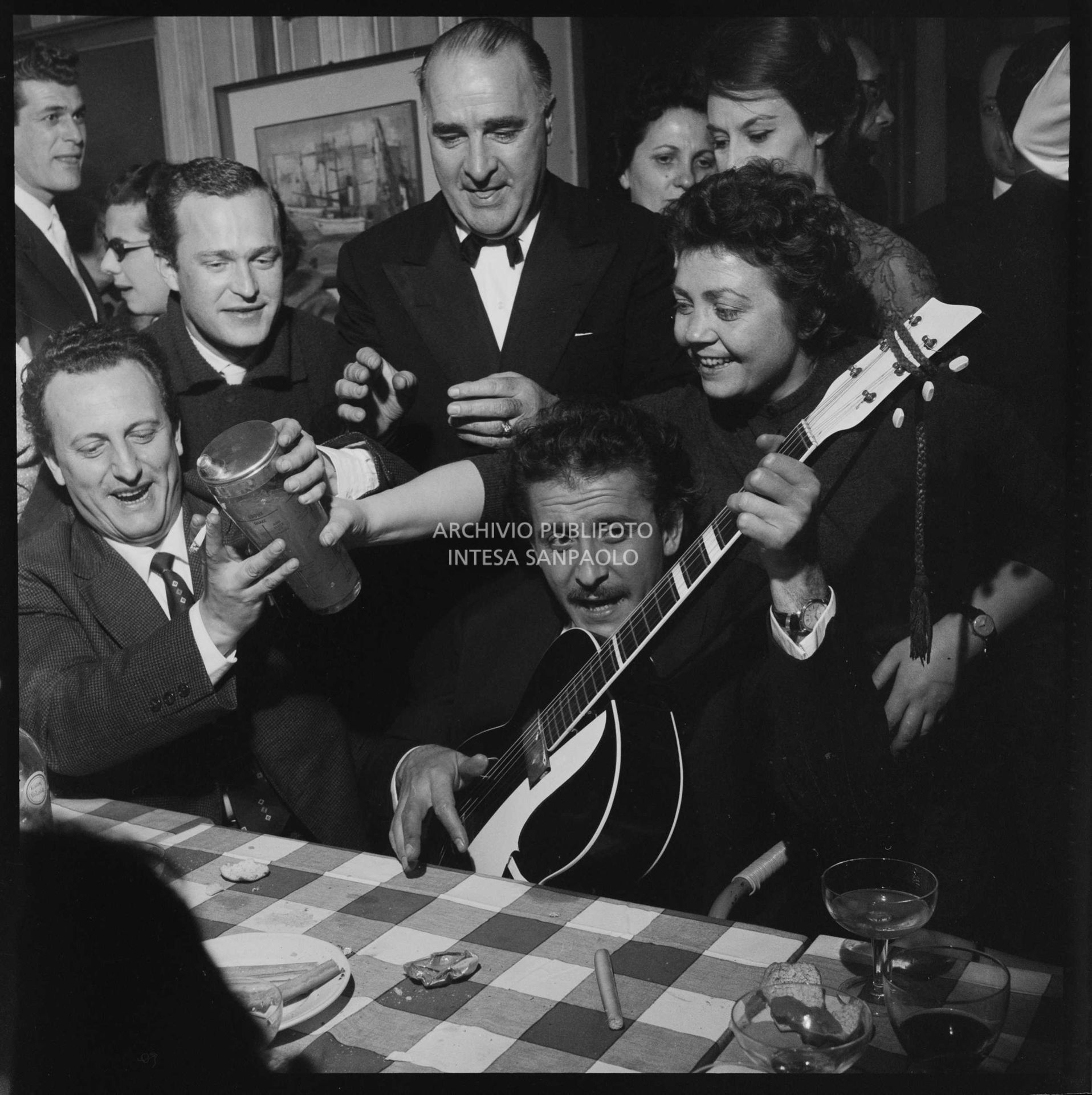 Domenico Modugno celebrates his success at the Sanremo Music Festival