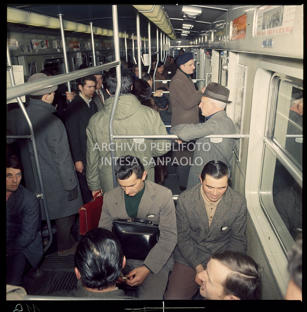 Passengers on the underground train in Milan
