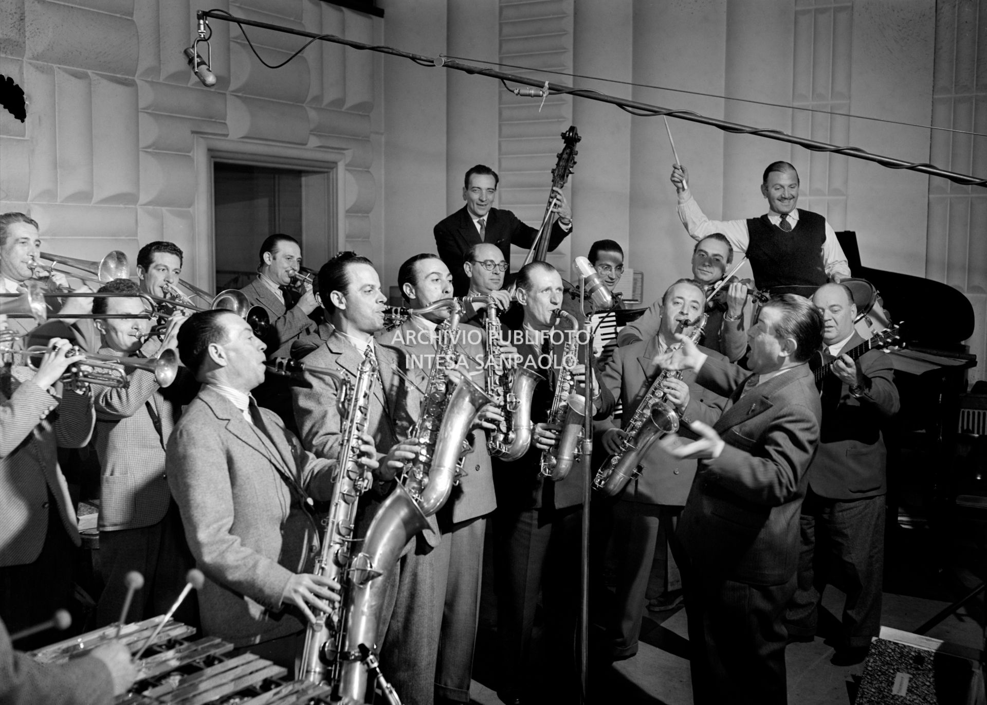 Maestro Angelini and his orchestra in a RAI recording studio in Turin