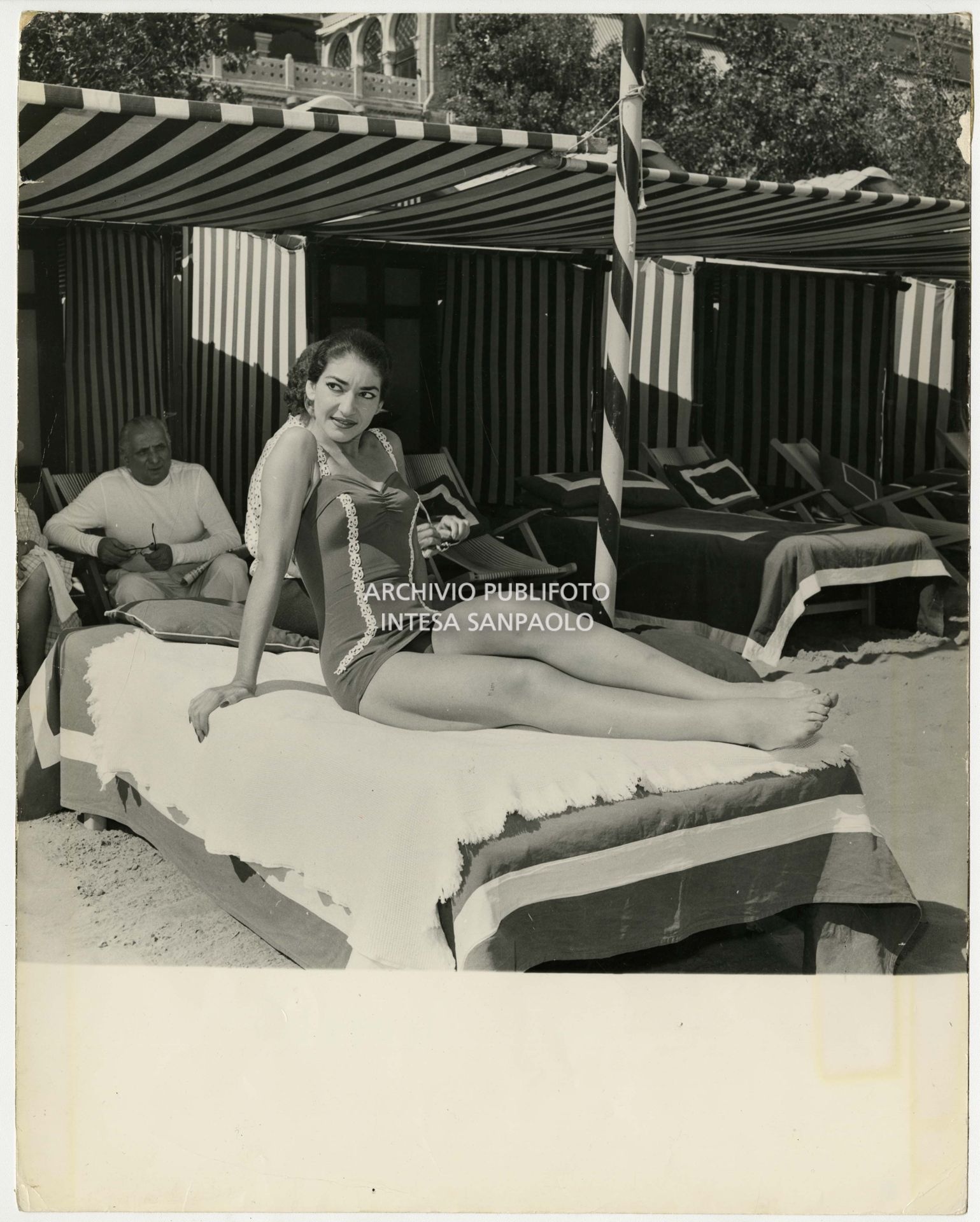 Maria Callas on the beach with her husband