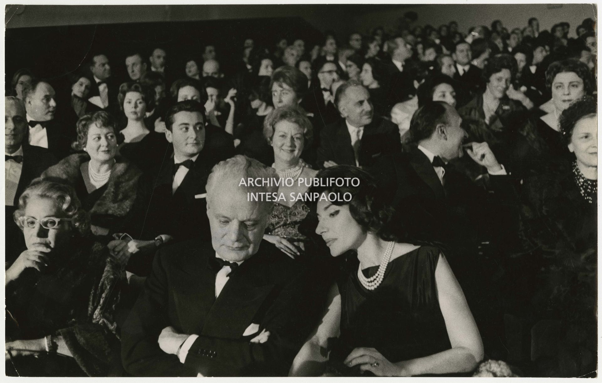 Maria Callas and Antonio Ghiringhelli at the premiere of Federico Fellini's La dolce vita at Milan's Capitol cinema