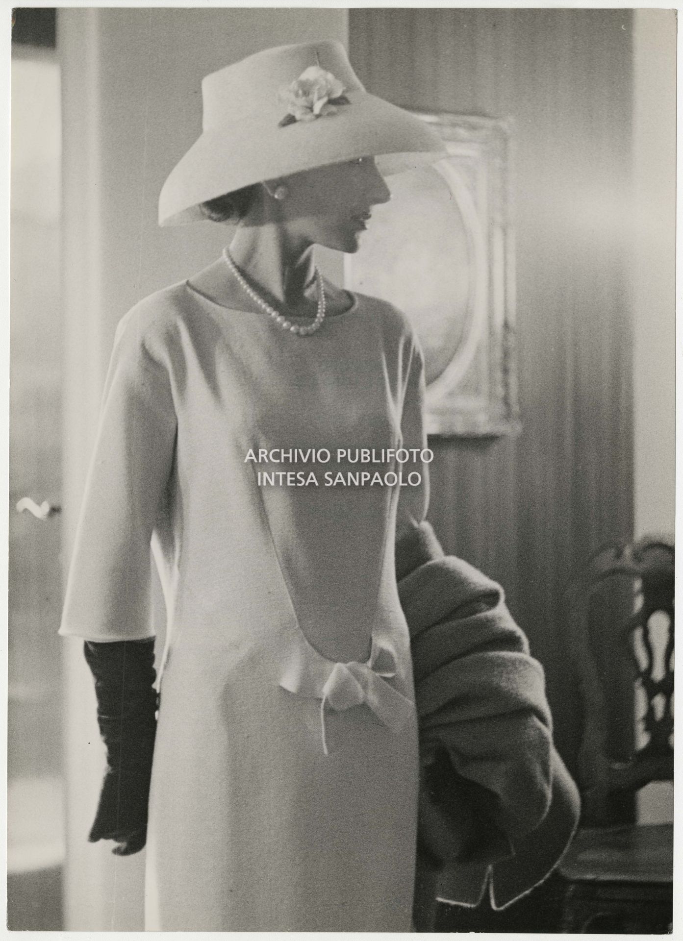Maria Callas pictured in her home, dressed by Biki