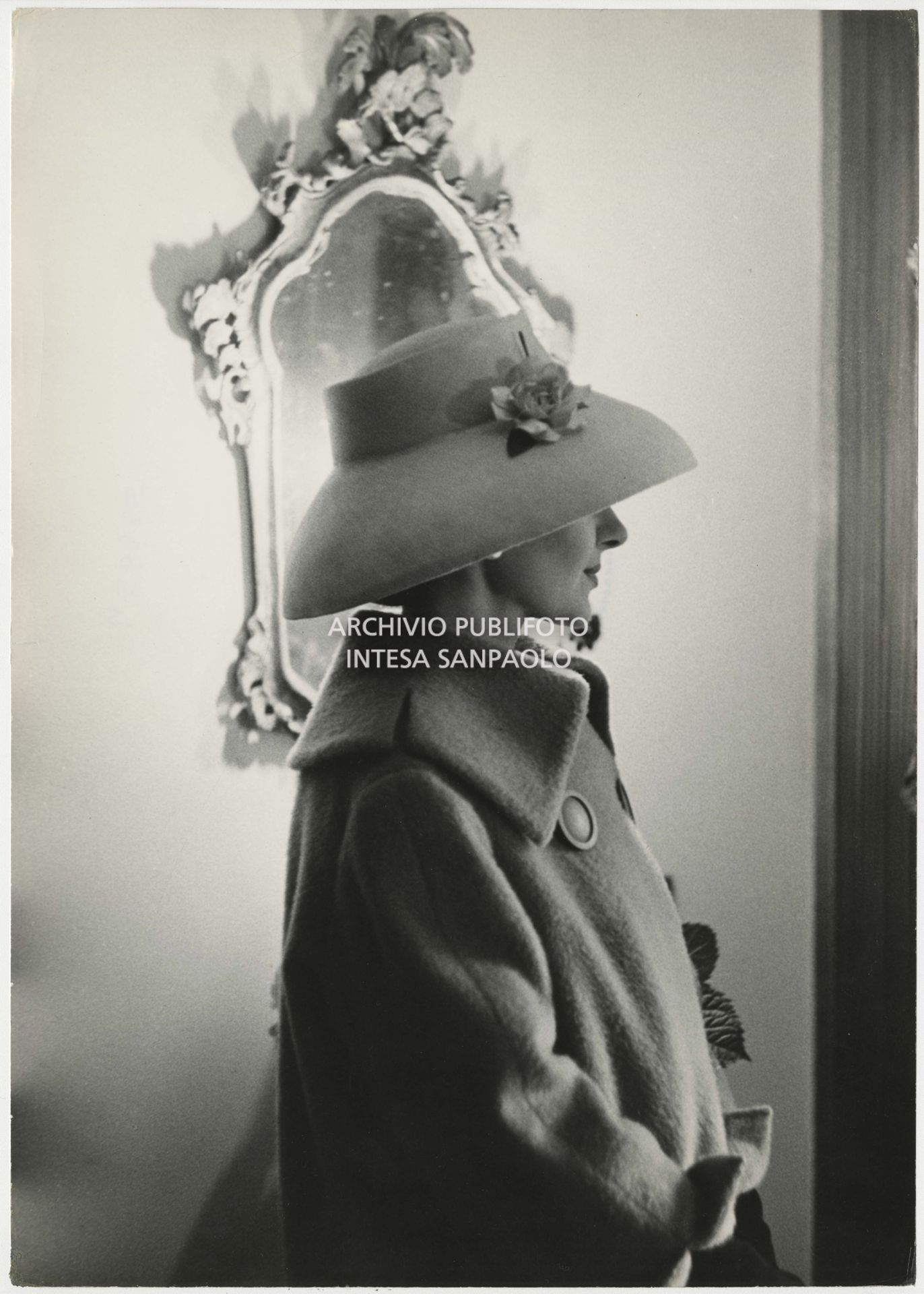 Maria Callas pictured in her home, dressed by Biki