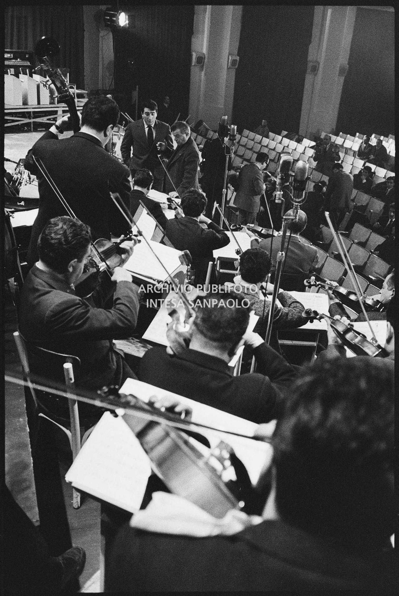 Tony Dallara with orchestra conductor Cinico Angelini at rehearsals for the 10th Sanremo Festival