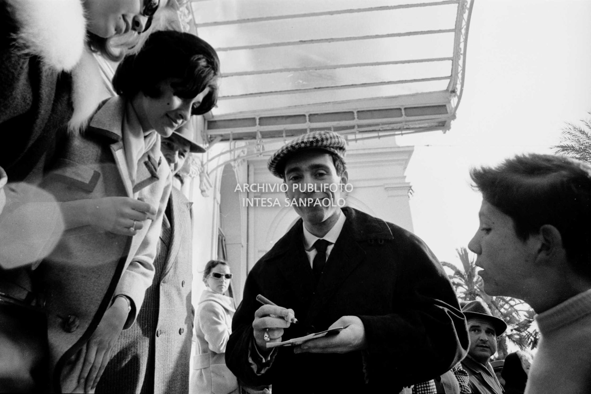Umberto Bindi signs autographs during the 11th Sanremo Festival
