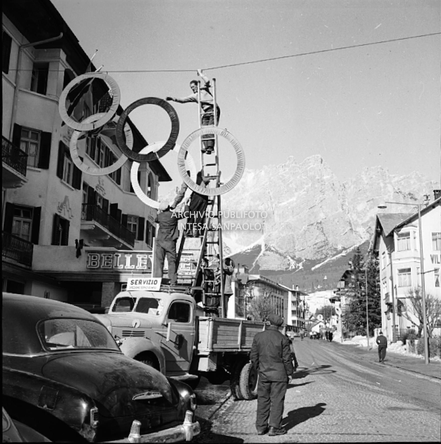 Installation of the Olympic rings in a street in Cortina d'Ampezzo