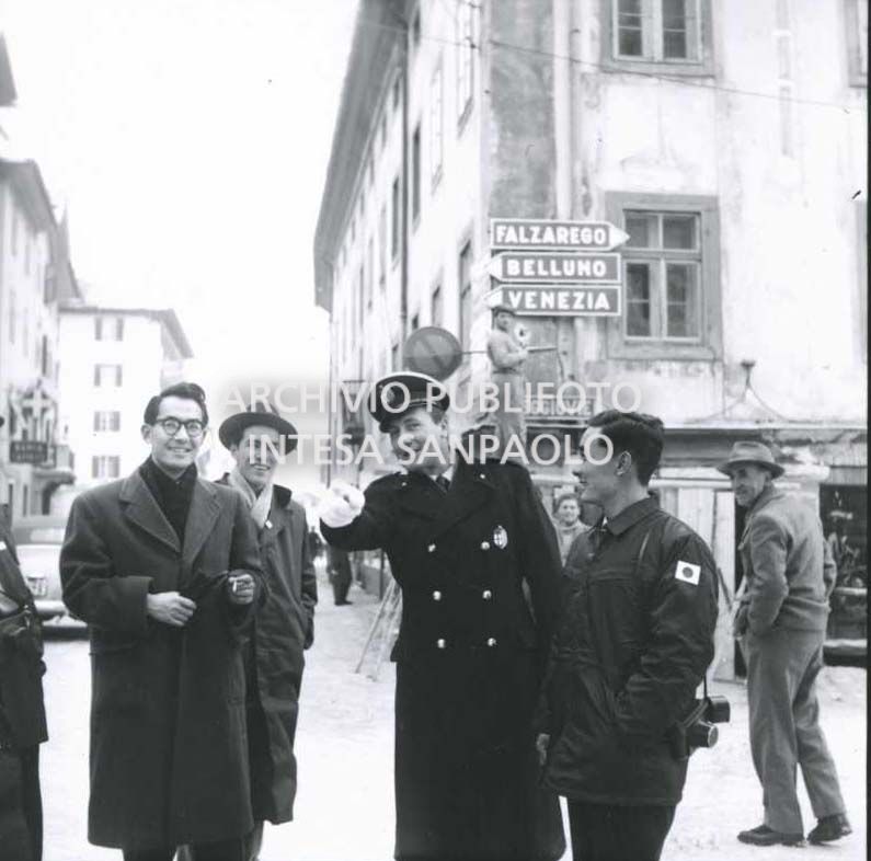 A traffic policeman in Cortina d'Ampezzo directing the traffic during the 7th Winter Olympic Games