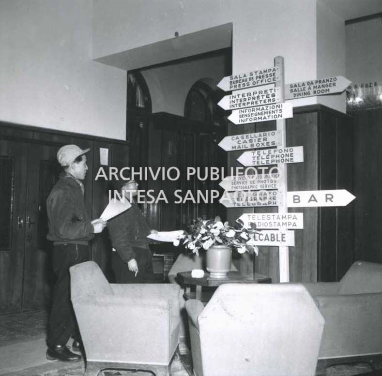 Sign indicating the facilities offered at the Savoia Hotel, where the Press Centre was based