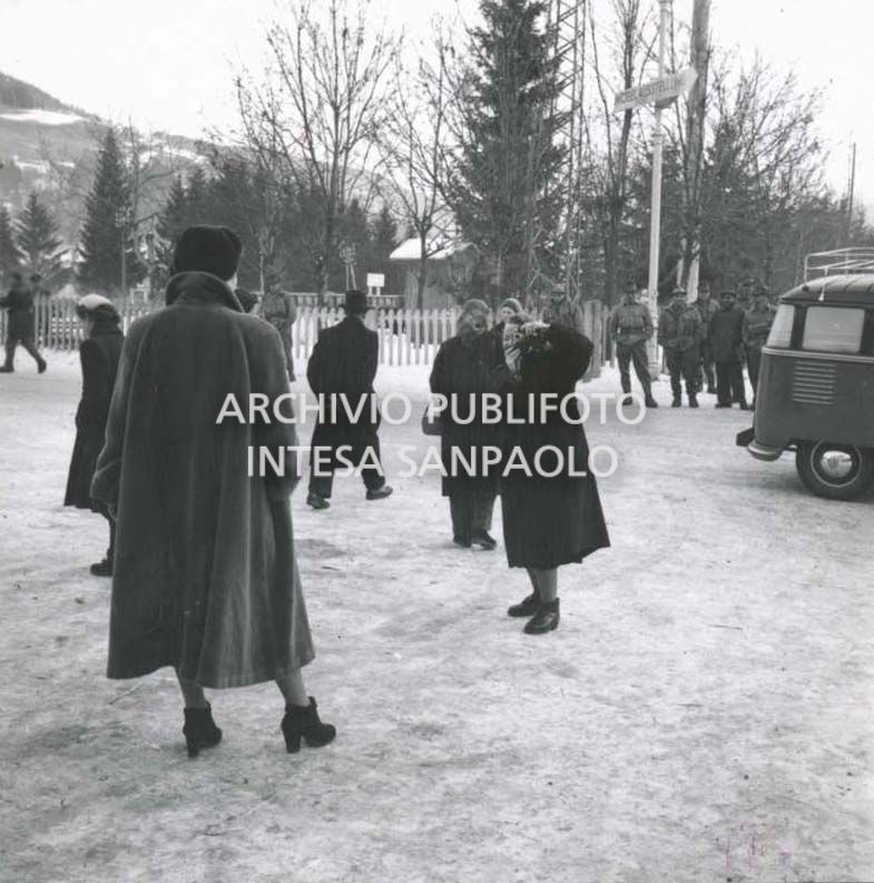 Two tourists in Cortina d'Ampezzo during the 7th Winter Olympic Games